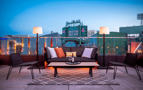 a beautiful outdoor seating area overlooking Fenway Park™